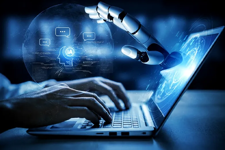 Main humaine et main robotique interagissant sur un ordinateur portable – Organisme de formation UDD